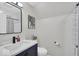 Bright bathroom featuring subway tile, dark vanity, and marble countertop at 14918 E 206Th St, Noblesville, IN 46060