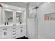 Modern bathroom featuring double vanity, updated tile, and walk-in shower at 14918 E 206Th St, Noblesville, IN 46060