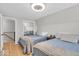 Charming bedroom with two beds and mirrored closet, perfect for guests or children at 14918 E 206Th St, Noblesville, IN 46060