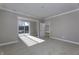 Spacious bedroom featuring neutral walls and carpet with slider to the backyard at 16774 Imperial Ct, Fishers, IN 46040