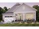 Charming one-story home with a welcoming covered porch and manicured lawn at 16774 Imperial Ct, Fishers, IN 46040