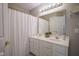 Bathroom featuring double sinks and a white shower curtain for a clean aesthetic at 17635 Willow Creek Way, Westfield, IN 46074