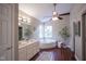 Bathroom with vanity, double sinks, a large soaking tub, and windows at 17635 Willow Creek Way, Westfield, IN 46074