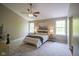 Spacious main bedroom with carpet, ceiling fan, and large windows at 17635 Willow Creek Way, Westfield, IN 46074