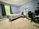 Bedroom featuring carpet flooring, a bed and blue accent walls at 2002 Grey Fox Ct, Martinsville, IN 46151