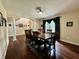 Formal dining room with wood floors and a large table setting at 2002 Grey Fox Ct, Martinsville, IN 46151