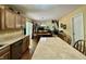 Spacious kitchen and dining area with hardwood floors, stainless steel appliances, and access to the backyard at 2002 Grey Fox Ct, Martinsville, IN 46151