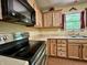 Well-maintained kitchen features modern appliances and ample counter space at 2002 Grey Fox Ct, Martinsville, IN 46151