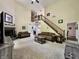 Spacious living room featuring a fireplace and staircase at 2002 Grey Fox Ct, Martinsville, IN 46151