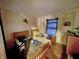 Shared bedroom with hardwood floors and natural light, ideal for or guests at 2074 W 300 S, Shelbyville, IN 46176