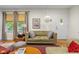 Inviting living room showcasing a comfortable sofa, stylish decor, and hardwood flooring at 2233 Washington St, Columbus, IN 47201