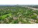 Expansive aerial view of the suburbs near the city featuring lush trees and easy highway access at 2433 E 16Th St, Indianapolis, IN 46201