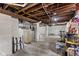 Unfinished basement space with exposed beams and utilities, ready for customization at 2433 E 16Th St, Indianapolis, IN 46201