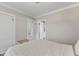A comfortable bedroom with neutral décor and a glimpse into the adjacent spaces at 2433 E 16Th St, Indianapolis, IN 46201