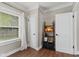 Bright room featuring neutral paint, decorative trim, and two doors at 2433 E 16Th St, Indianapolis, IN 46201