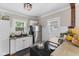 Efficient kitchen features white cabinets, stainless appliances, and concrete countertops at 2433 E 16Th St, Indianapolis, IN 46201