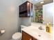 Traditional bathroom with vanity, mirror, toilet, and colorful shower curtain at 29 Northview Dr, Danville, IN 46122