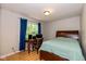 Bedroom with natural light, desk, workspace, and comfortable bed at 29 Northview Dr, Danville, IN 46122