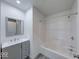 Bathroom featuring a grey vanity and walk in shower with new fixtures at 32 Downing Dr, Trafalgar, IN 46181
