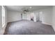 Large bedroom with ceiling fan, closet and access to Primary bathroom at 32 Downing Dr, Trafalgar, IN 46181