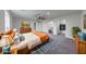 Bright bedroom with decorative furniture, lighting and access to Primary bathroom at 32 Downing Dr, Trafalgar, IN 46181
