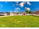 Well-kept lawn and brick and stone exterior, creating a welcoming and visually appealing curb appeal at 32 Downing Dr, Trafalgar, IN 46181