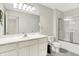 Bright bathroom features white cabinetry, and modern fixtures at 3428 Thomas Jefferson St, Westfield, IN 46074