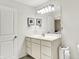Bright bathroom with white vanity and modern lighting fixtures at 3428 Thomas Jefferson St, Westfield, IN 46074