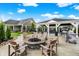 Inviting outdoor fire pit area with Adirondack chairs, perfect for community gathering and relaxation at 3428 Thomas Jefferson St, Westfield, IN 46074