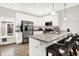 Modern kitchen with white cabinets, breakfast bar and stainless steel appliances at 3428 Thomas Jefferson St, Westfield, IN 46074