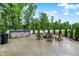 Outdoor kitchen and fire pit, ideal for entertaining guests in a beautifully landscaped setting at 3428 Thomas Jefferson St, Westfield, IN 46074