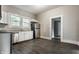 Updated kitchen with stainless steel appliances, ample cabinet space, and modern finishes, ready for culinary adventures at 3652 N Kenwood Ave, Indianapolis, IN 46208