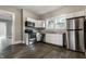 Well-equipped kitchen featuring stainless steel appliances, ample storage, and a functional layout for cooking and entertaining at 3652 N Kenwood Ave, Indianapolis, IN 46208
