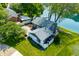 This waterfront property includes lush greenery, mature trees, and lovely landscaping at 3701 Sandy Hook Dr, Columbus, IN 47203