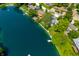 Overhead view of a lake house featuring the property lines, beach access, and beautiful lake at 3701 Sandy Hook Dr, Columbus, IN 47203
