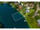 An aerial view of the home's location on a lake, as indicated by the highlighted border at 3701 Sandy Hook Dr, Columbus, IN 47203