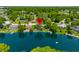An aerial view of the property on the lake with the placement pin showing its location at 3701 Sandy Hook Dr, Columbus, IN 47203