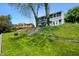 Waterfront property features lush greenery and convenient access to the water at 3701 Sandy Hook Dr, Columbus, IN 47203