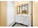 Bathroom featuring a shower and white vanity with a decorative backsplash at 3701 Sandy Hook Dr, Columbus, IN 47203