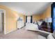 Bright bedroom with neutral carpet, natural light, and matching furniture at 3701 Sandy Hook Dr, Columbus, IN 47203
