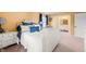 Bedroom with a bed featuring white bedding and a view of the ensuite bathroom at 3701 Sandy Hook Dr, Columbus, IN 47203