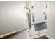 View of the entryway featuring a white door, tiled floor, and decorative shelving at 3701 Sandy Hook Dr, Columbus, IN 47203