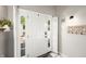 Bright foyer featuring a white front door with sidelights and decorative accents at 3701 Sandy Hook Dr, Columbus, IN 47203
