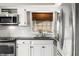 Kitchen with stainless steel appliances, granite countertops, and subway tile backsplash at 3701 Sandy Hook Dr, Columbus, IN 47203