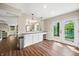 Beautiful, updated kitchen with breakfast bar and french doors with a lake view at 3701 Sandy Hook Dr, Columbus, IN 47203