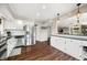 Spacious open kitchen with stainless appliances, granite countertops, and a breakfast bar at 3701 Sandy Hook Dr, Columbus, IN 47203