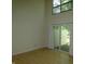 Spacious living room with wood flooring, and sliding glass doors to a deck at 4486 Abby Creek Ln, Indianapolis, IN 46205