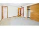Spacious bedroom with neutral walls, carpet, and closet with wood sliding doors at 4733 E 100 S, Anderson, IN 46017