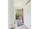Welcoming entryway with hardwood floors, a secure door, and a stylish area rug at 4733 E 100 S, Anderson, IN 46017