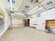 A large unfinished garage featuring concrete flooring and ample space at 4733 E 100 S, Anderson, IN 46017